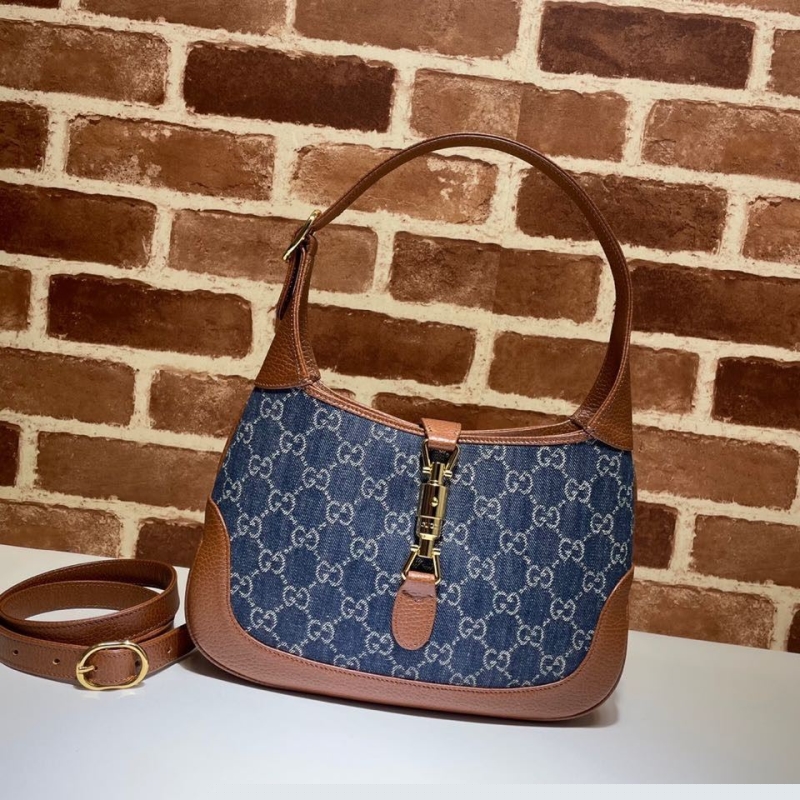 G*u*i top handle bags